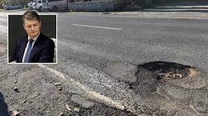 Premier backtracks on 500,000 pothole pledge | Flat out: Mechanic rescues tyre-wrecked drivers | …