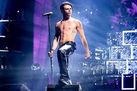 Pop star Yungblud ditches his clothes, bares all during wild private yacht party | Yungblud Wears…