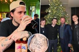 Brooklyn Beckham covers up tattoos of his siblings after removing tribute ink to dad David | Tiny…