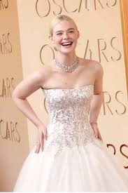 Elle Fanning Is a Princess in a Strapless White Ball Gown at the 2026 Oscars | Elle Fanning Looks…