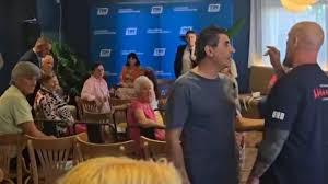 Federal MP’s event gatecrashed by ethno-nationalist organisation | Police investigating after Tim…