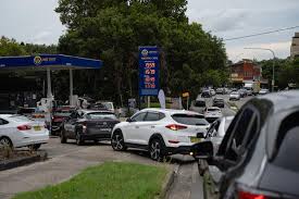 Long queues at servos as petrol prices surge amid Middle East war | Australian energy bills could…