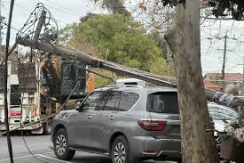 Car crash brings down power pole in Melbourne’s north | A parked car in Essendon just got crunche…