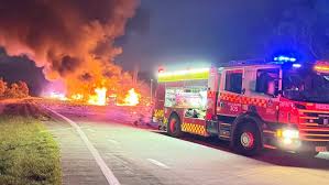 Police say ‘miracle’ no-one killed as six trucks destroyed in fiery crash | Truck drivers ‘mira…