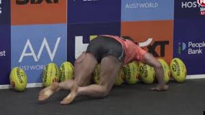 Footage of AFL star’s act is seriously wild | Rowell sniffs all match balls to pick favourite |…
