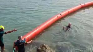 Spanish authorities have installed a floating barrier in Ceuta after more than 60,000 migrants st…